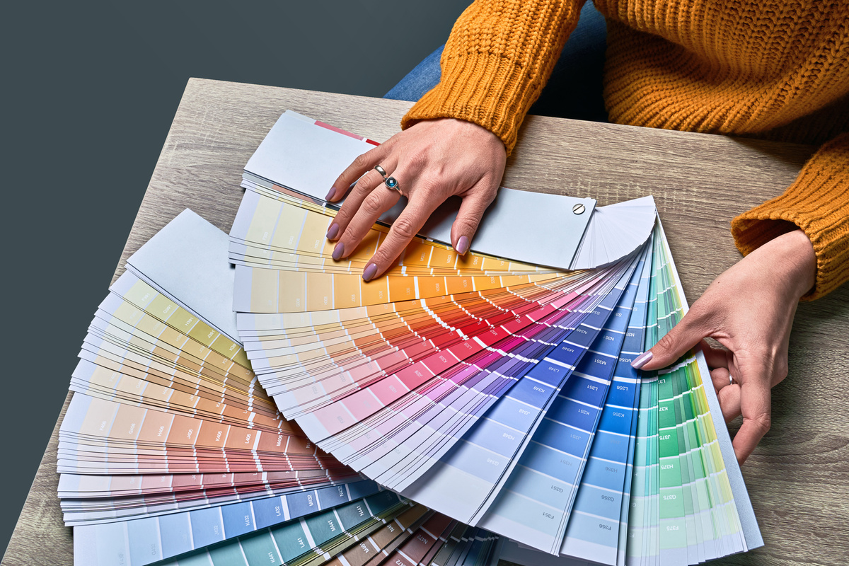 Person Choosing Paint Tone on Spectrum